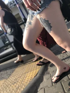 Hot Tattooed Legs in Slippers Street Creepshot