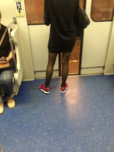 Girl in Black Pantyhose and a Skirt Subway Candid