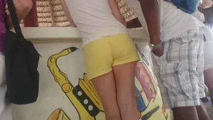 Milf in yellow shorts with vpl and a wedgie