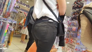Cute nerdy teen shopping at Claires in tight jeans with a nice bubble butt