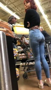 Awesome ass and very long legs in tight blue jeans