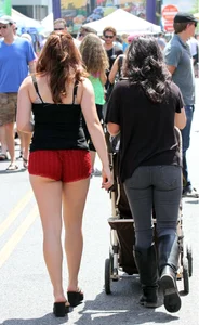 Stocky Candid Girl in Red Shorts Street Photo