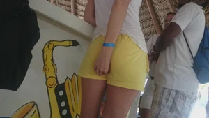 Milf in yellow shorts with vpl and a wedgie