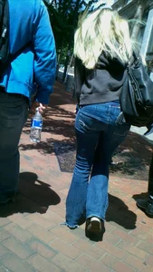 Blonde in tight jeans with her red thong sticking out