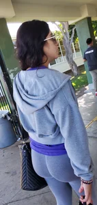 Latina cutie with a round ass in grey leggings