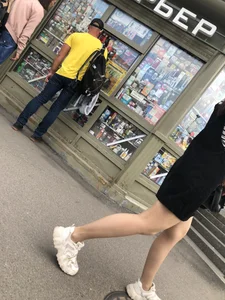 Candid girl in a short dress and stockings, awesome legs