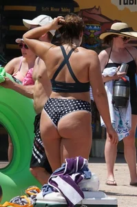 Girls in bikinis getting ready for tubing