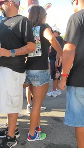 Brunette babe standing around in denim shorts