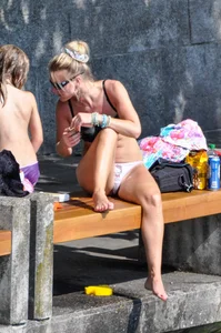 Blonde milf looking sexy in Hello Kitty bikini with nice mound and camel toe