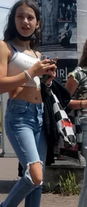 Hot teen in a crop top and ripped jeans street creepshots