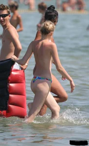 A bunch of sexy beach voyeur babes in bikinis, thongs and topless