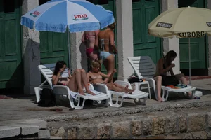 Nude girls on a beach in Hvar, Croatia
