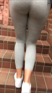 Teen girl in tight grey leggins