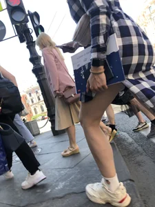 Nice legs of a candid girl crossing the street