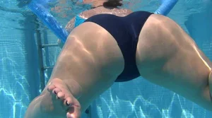 Mature Mexican lady in a swimsuit with a huge ass