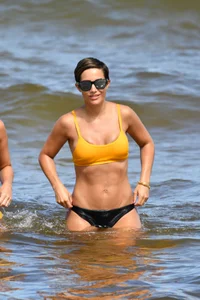 Frankie Bridge nip slips in a bikini on the beach