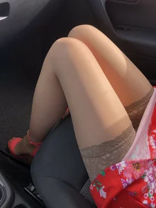 Legs in Stockings and Dress in the Car Candid