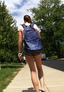 Hot college girl in little jean shorts showing some cheeks and legs