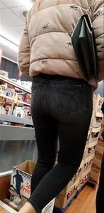 Teen in tight jeans shopping