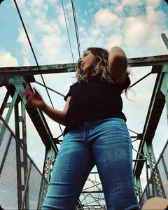Teen in blue jeans low angle pic