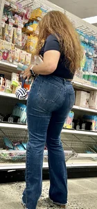 Curly hair lady in jeans @