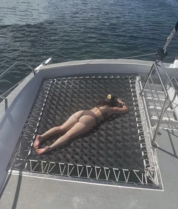 Candid Girl With a Hot Chunky Ass in a Swimsuit Lying on a Trampoline on a Boat Creepshot
