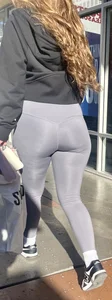 Sexy girl in grey leggings showing ass and cameltoe