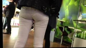 Brunette with a nice ass in tight white jeans