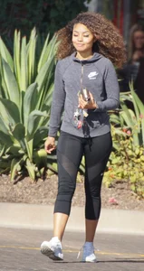 Beautiful black girl in Nike leggings in the parking lot