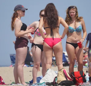 Group of sexy girls on the beach in bikinis with nice bodies