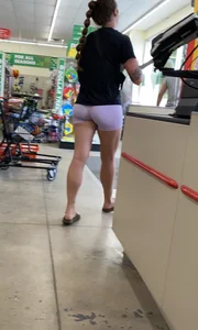 in purple Lycra shorts…