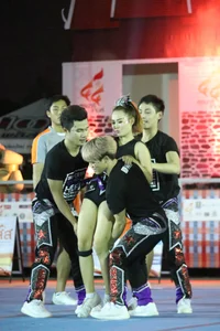 Bunch of athletic Thai cheerleaders at a competition