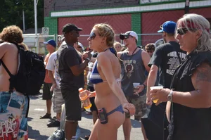 Hot ass Canadian babe in a bikini dancing at a concert