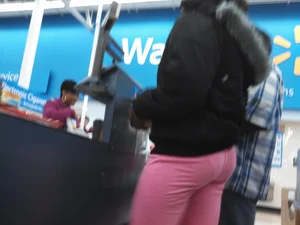 Ebony girl with a cute booty and vpl in pink sweats at Walmart