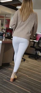 Gorgeous slim blonde in white jeans