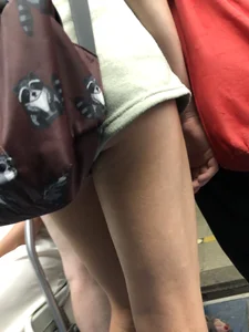 Skinny Candid Teen's Legs in Shorts With Visible Leg Hair Subway Photo Gallery