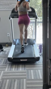 Fit brunette on treadmill