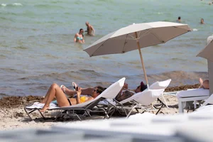Frankie Bridge nip slips in a bikini on the beach