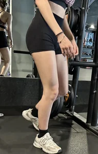 Hot blonde with great ass in gym