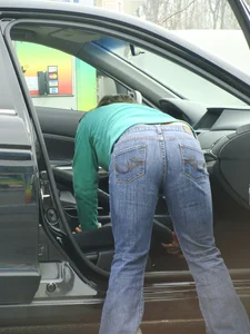 Girls cleaning their cars in jeans and pants