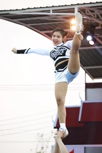 Bunch of athletic Thai cheerleaders at a competition