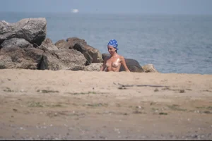 Girls on a nude beach in Bibione, Italy