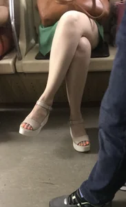 Hot Crossed Legs And Feet in Sandals in a Subway Train Creepshot