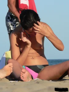 Sexy girls going topless at the beach showing off their sexy bodies