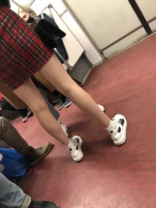 Hot slim legs in subway