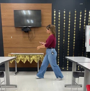 Thick target Asian baddie in tight jeans (bending over)
