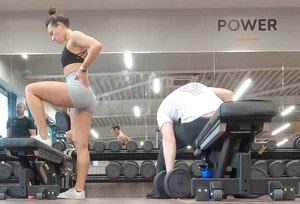 Gym brunette in tight grey shorts bending over, part 3