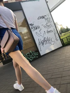 Sexy street candid girl in shorts