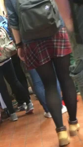 Teen Candid Student in a Skirt And Black Pantyhose Legs Closeup