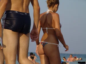 A bunch of sexy beach voyeur babes in bikinis, thongs and topless